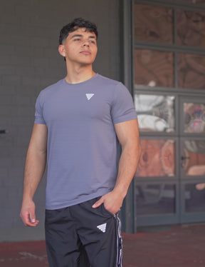GORNATION athlete wearing the GORNATION active t-shirt in grey